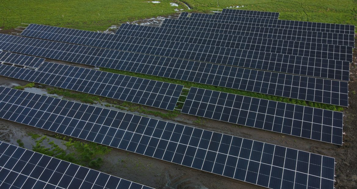 Aerial view of solar power plant solar panels. Electric panels for producing clean ecologic energy.